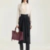 Medium the Snatch Bag in Grained Leather Medium the Snatch Bag in Grained Leather