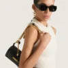 Pout Small Bag in Leather with Lucky Charms Chain Pout Small Bag in Leather with Lucky Charms Chain